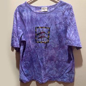 Purple Tee with beautiful colored dolphins.  Sz. Large.  Excellent shape.